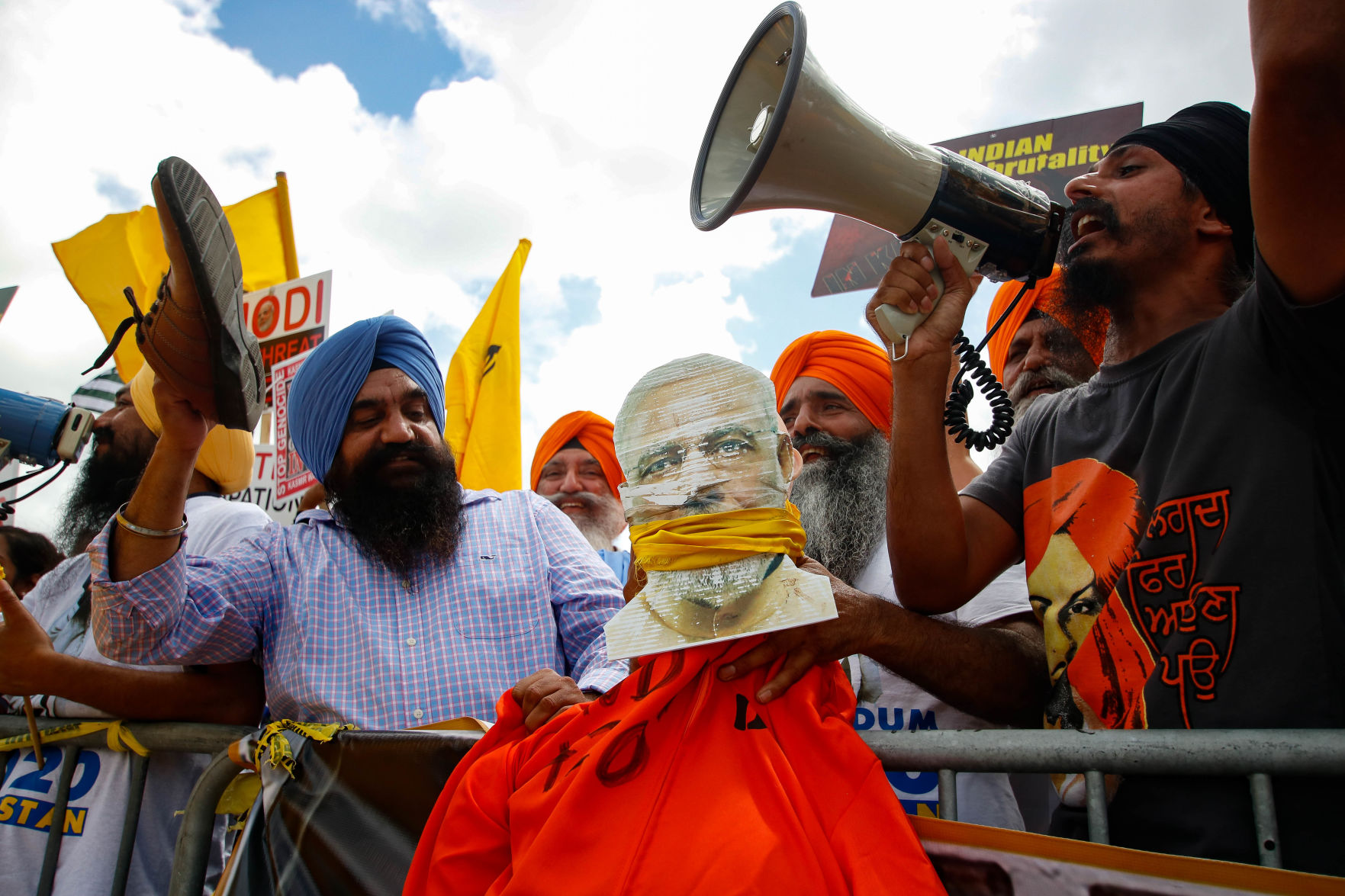 Protesters rally outside President Donald Trump, Indian Prime Minister Narendra Modi summit in Houston